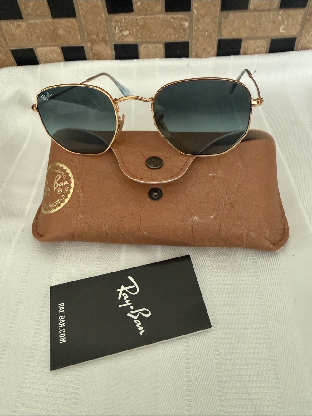 Wore once Ray-Ban Women's Gold Frame. No return please.